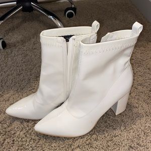 White heeled boots with inside ankle zipper